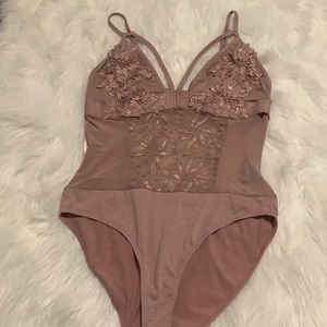 Size medium bodysuit